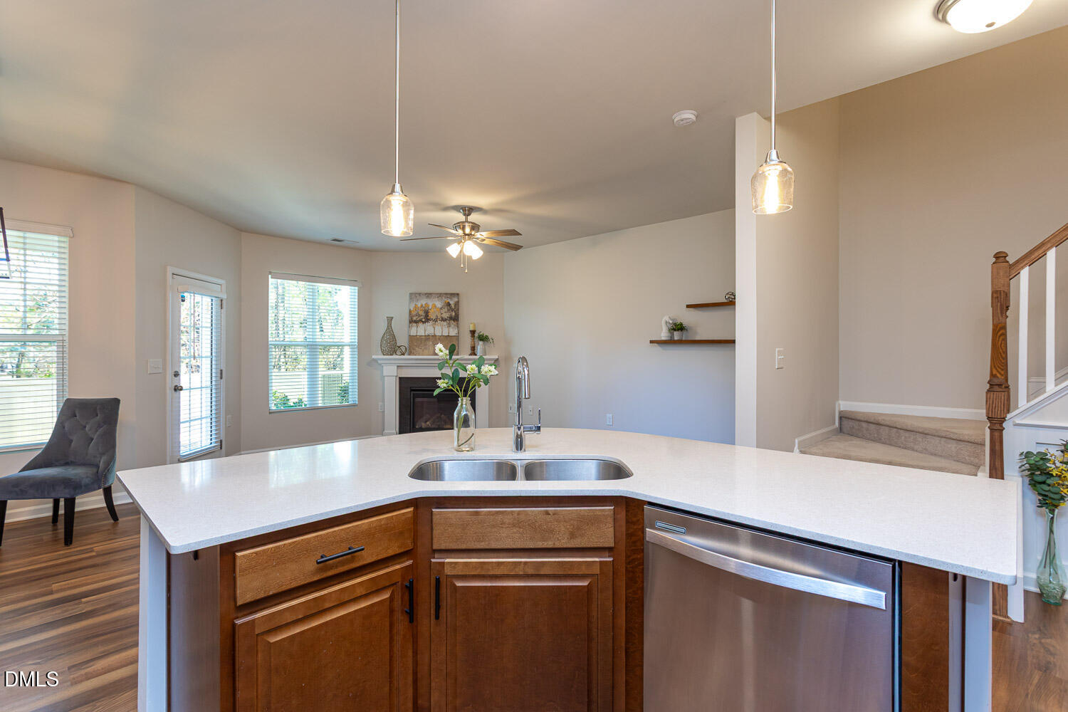 6197 Beale Loop Raleigh, NC 27616 - Photo 5 of 20 a kitchen with a sink and a refrigerator