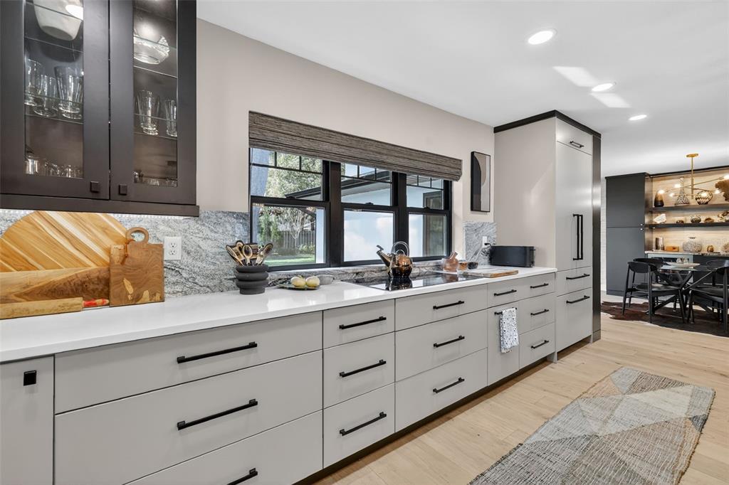241 Bay Road Mount Dora, FL 32757 - Photo 17 of 57 a large bathroom with a double vanity sink a mirror and next to a window