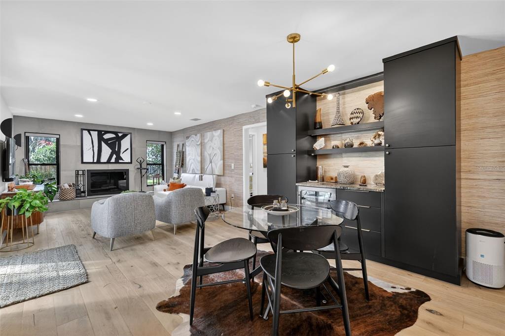 241 Bay Road Mount Dora, FL 32757 - Photo 19 of 57 a living room with furniture and a chandelier