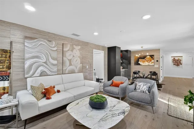 a bedroom with a bed and lamp