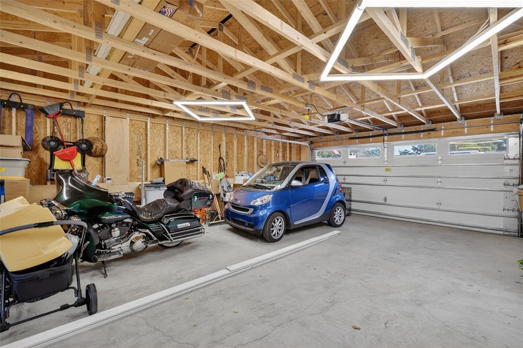 241 Bay Road Mount Dora, FL 32757 - Photo 48 of 57 a view of a garage with parked cars
