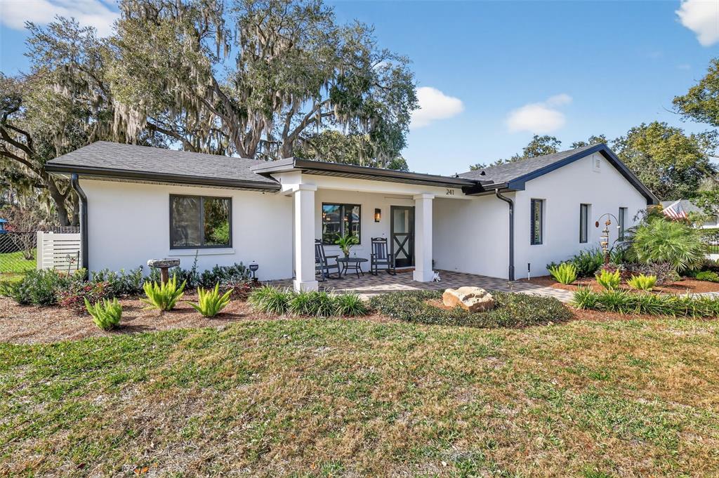 241 Bay Road Mount Dora, FL 32757 - Photo 7 of 57 a front view of house with yard