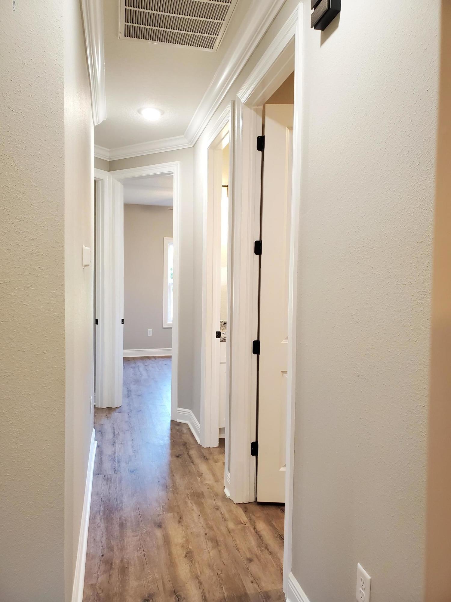 15300 Big Ridge Road Biloxi, MS 39532 - Photo 23 of 33 Hall to Guest Bedrooms