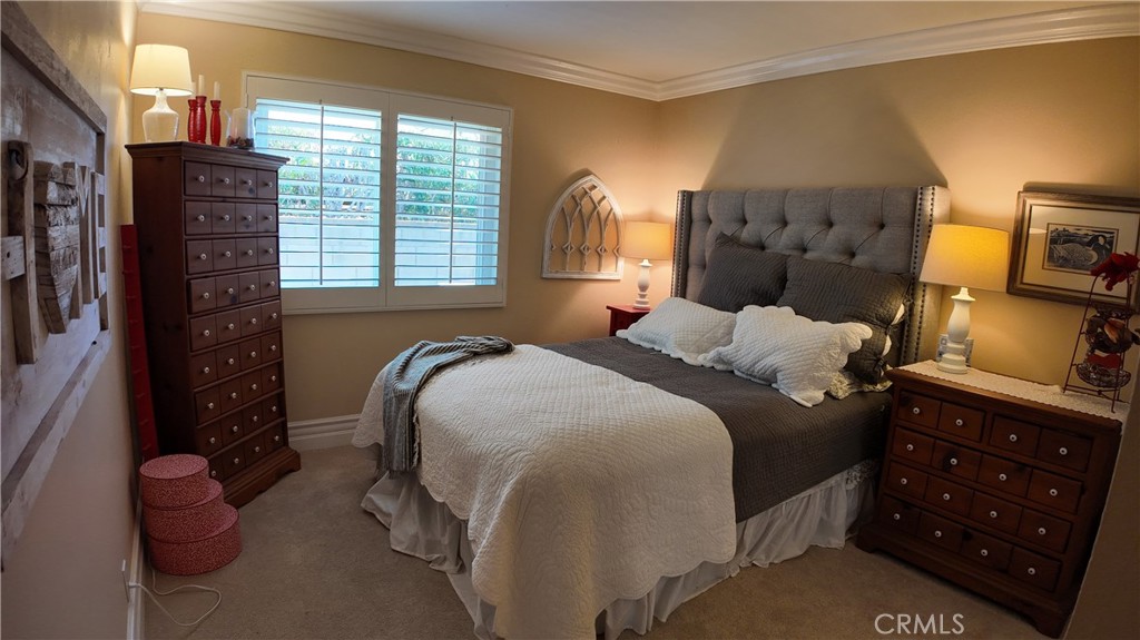 43080 Vista Del Rancho Temecula, CA 92592 - Photo 28 of 57 a bedroom with a bed and a television