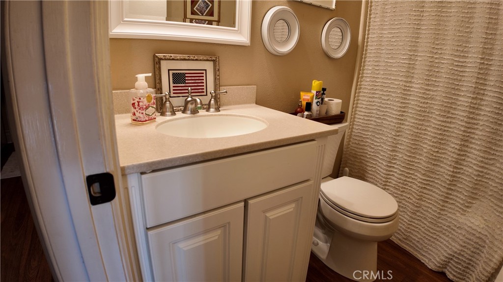 43080 Vista Del Rancho Temecula, CA 92592 - Photo 30 of 57 a bathroom with a toilet and a sink