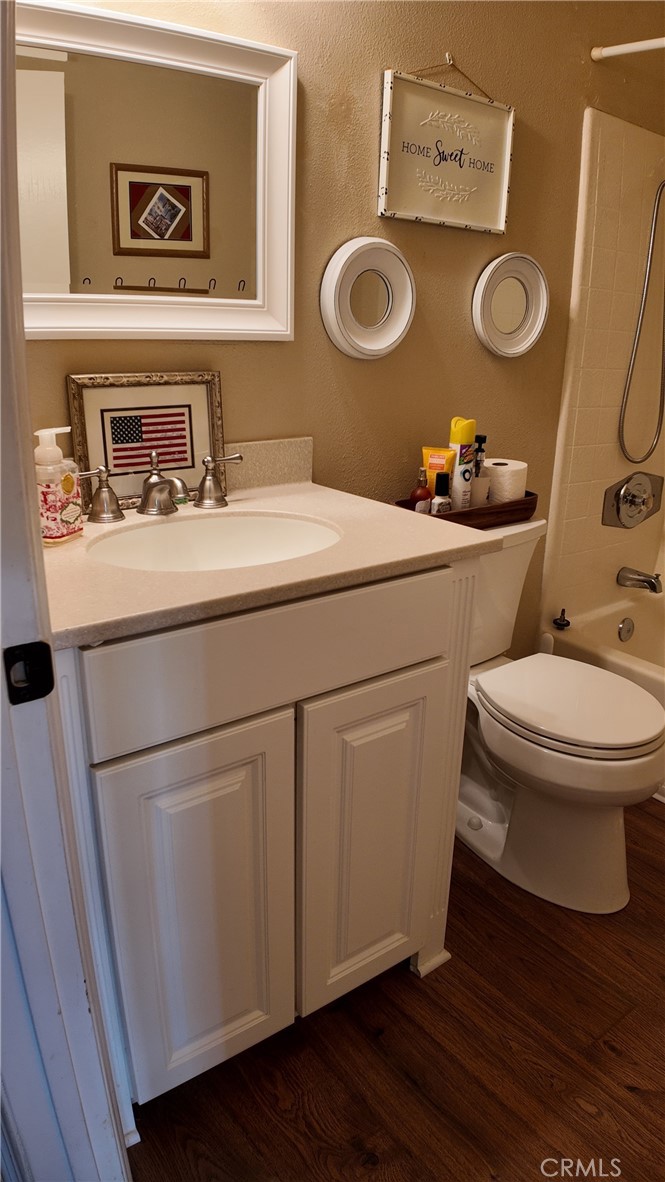 43080 Vista Del Rancho Temecula, CA 92592 - Photo 34 of 57 a bathroom with a toilet sink and mirror