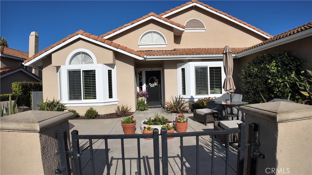 43080 Vista Del Rancho Temecula, CA 92592 - Photo 4 of 57 a front view of a house with glass windows