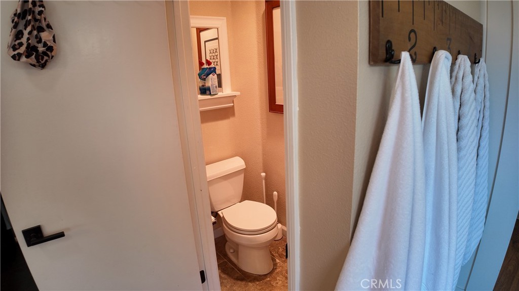 43080 Vista Del Rancho Temecula, CA 92592 - Photo 48 of 57 a white toilet sitting next to a small sink