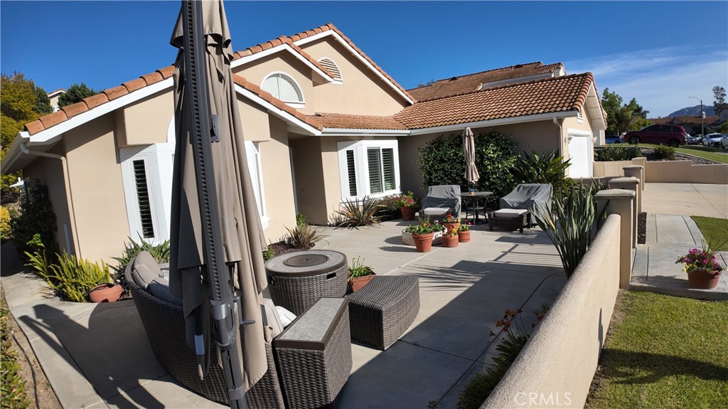 43080 Vista Del Rancho Temecula, CA 92592 - Photo 6 of 57 a view of a patio with couches chairs and potted plants