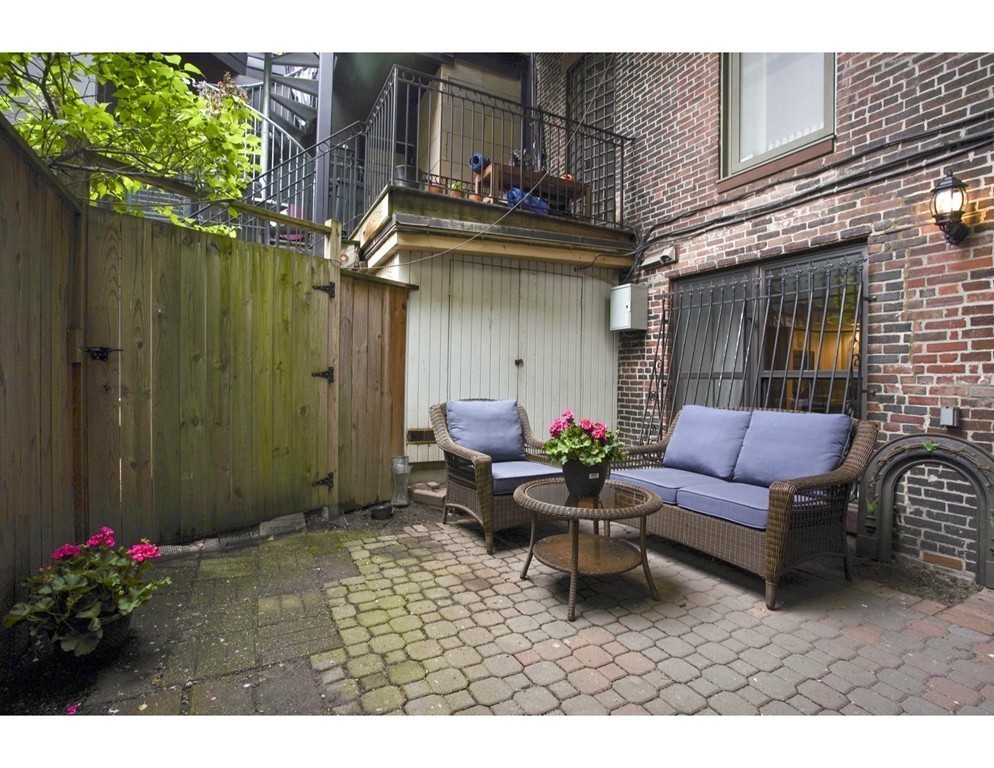 1670 Washington Street, Unit 6 Boston, MA 02118 - Photo 13 of 17 a outdoor living space with furniture and flowers