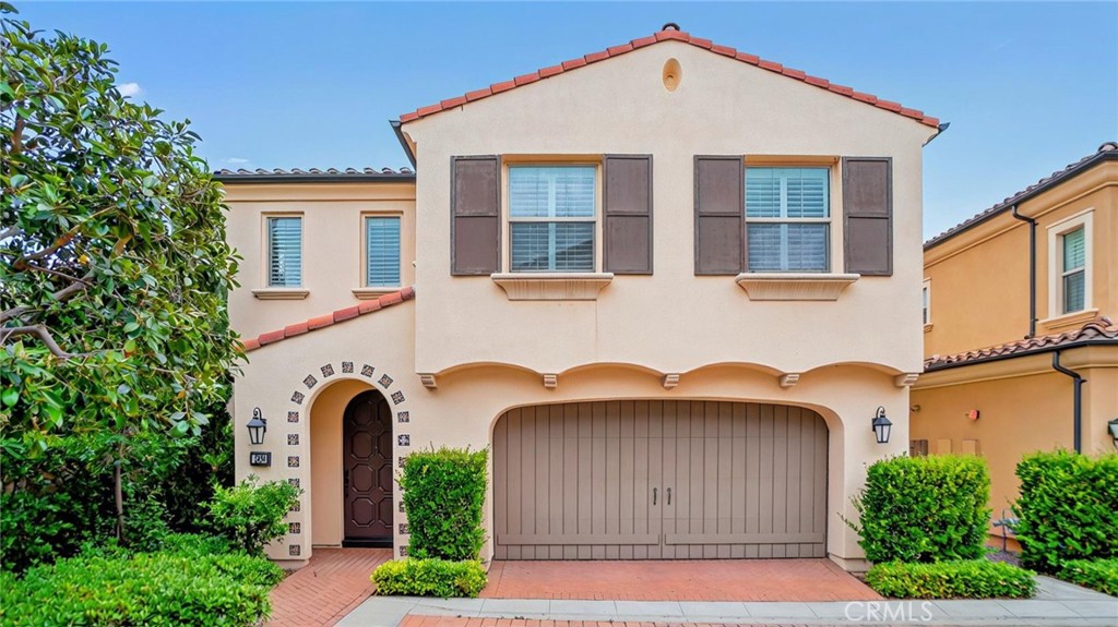 128 Gulfstream Irvine, CA 92620 - Photo 1 of 1 a front view of a house with garden