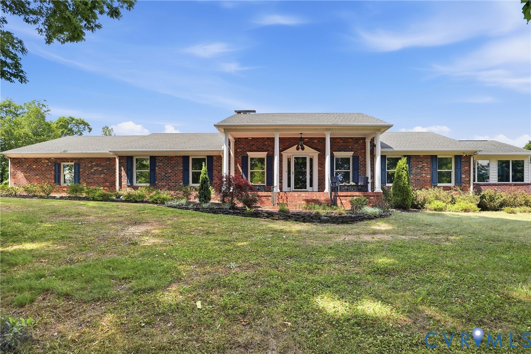 13300 West Patrick Henry Road Doswell, VA 23047 - Photo 2 of 69 Brick exterior featuring a covered portico with wh