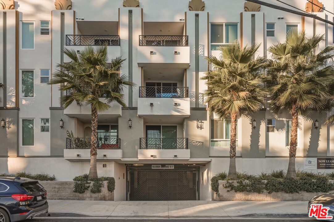 1759 North Gower Street, Unit 404 Los Angeles, CA 90028 - Photo 23 of 23 a front view of a building with street view