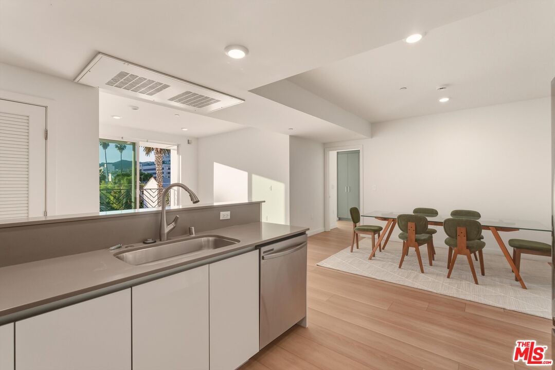 1759 North Gower Street, Unit 404 Los Angeles, CA 90028 - Photo 7 of 23 a very nice looking living room with a large window