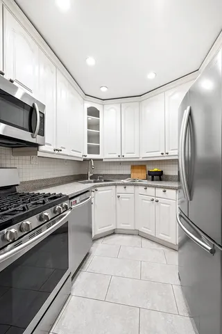 a living room with patio furniture