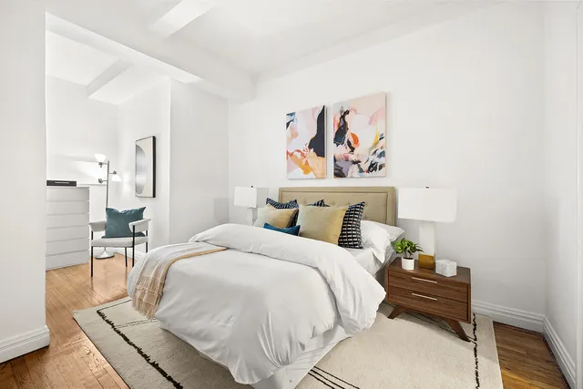 a kitchen with granite countertop a stove sink and cabinets
