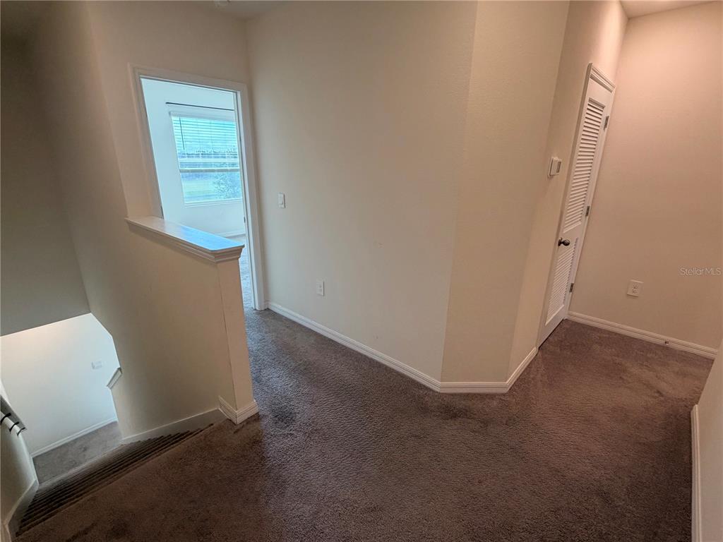 17534 Crescent Moon Loop Bradenton, FL 34211 - Photo 9 of 18 a view of a room with closet