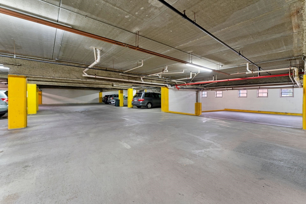 31 Spring Street, Unit 308 Watertown, MA 02472 - Photo 18 of 37 a view of parking garage