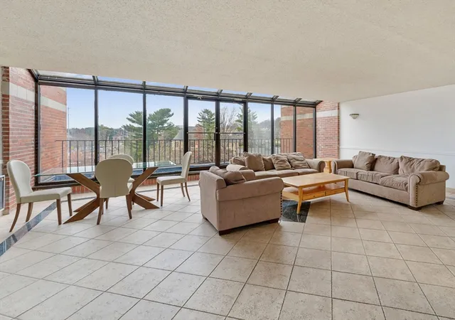 a view of parking garage with cars