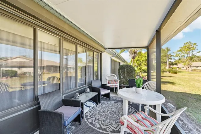 a view of a house with basketball court