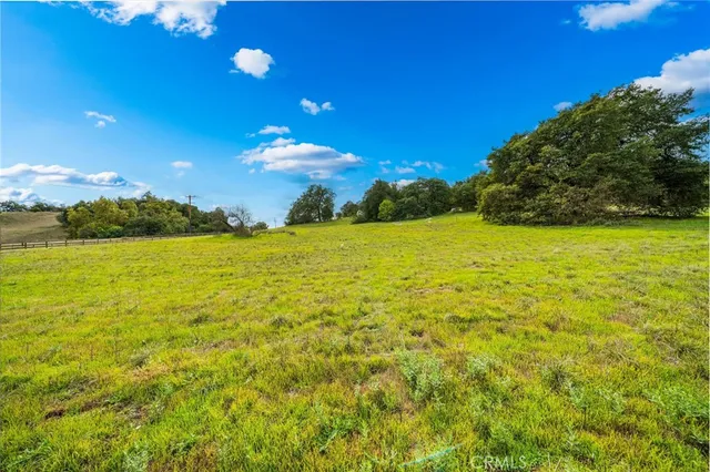 a view of an ocean and a yard