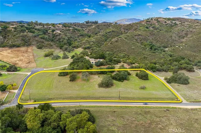 a view of swimming pool with a yard and seating area