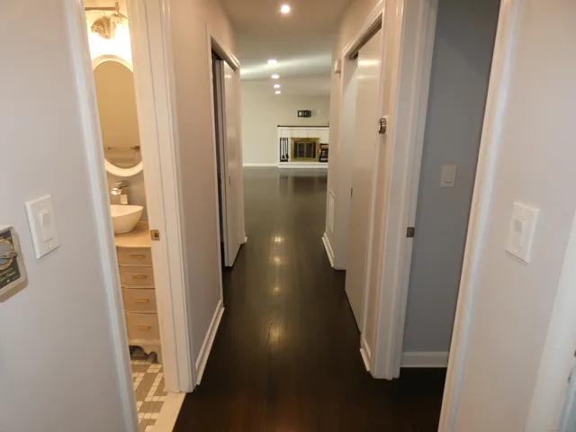 a view of a hallway with windows