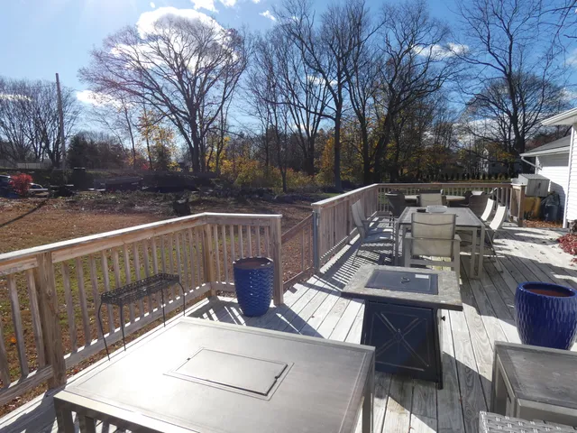 a view of roof deck with patio