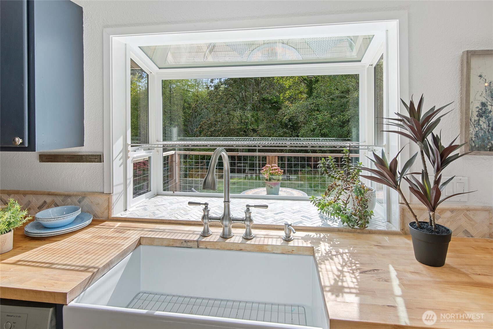 10211 Northeast Roberts Road Bainbridge Island, WA 98110 - Photo 14 of 39 a view of a living room and window