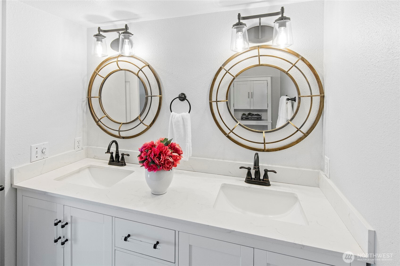 10211 Northeast Roberts Road Bainbridge Island, WA 98110 - Photo 20 of 39 a bathroom with a sink and a mirror
