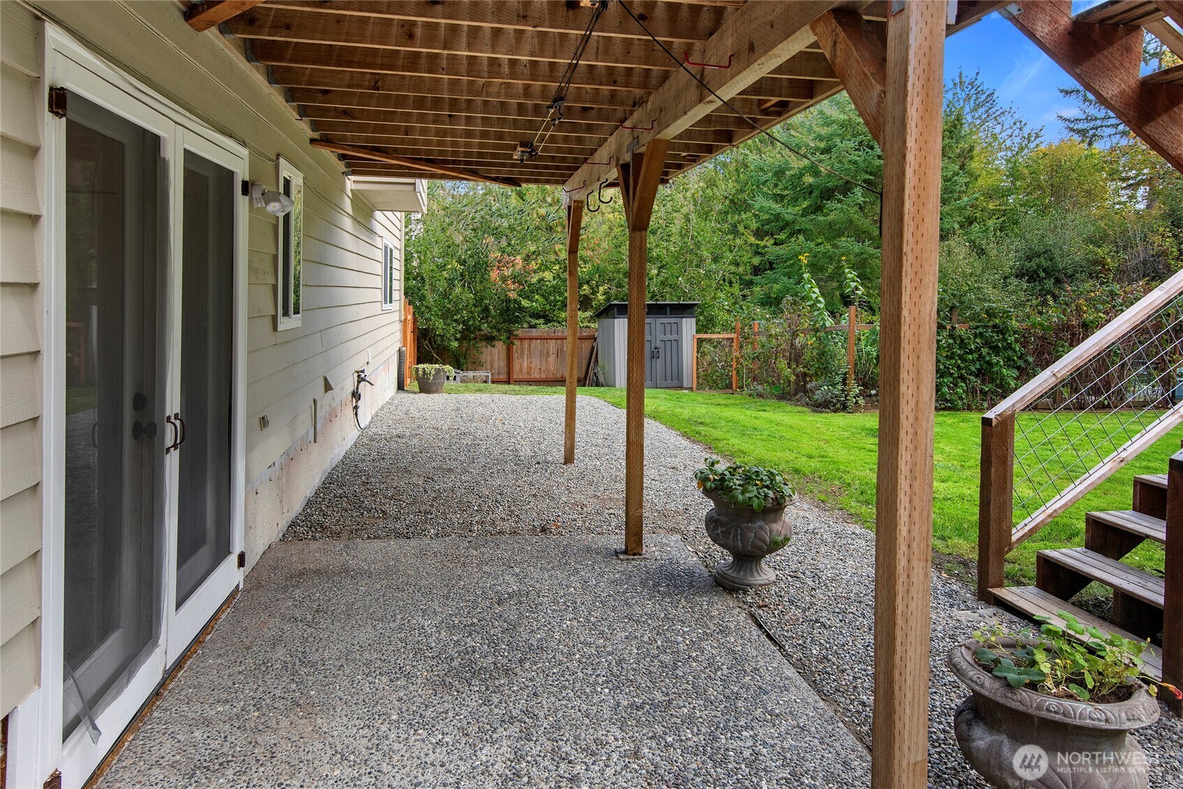10211 Northeast Roberts Road Bainbridge Island, WA 98110 - Photo 32 of 39 a view of a porch with backyard