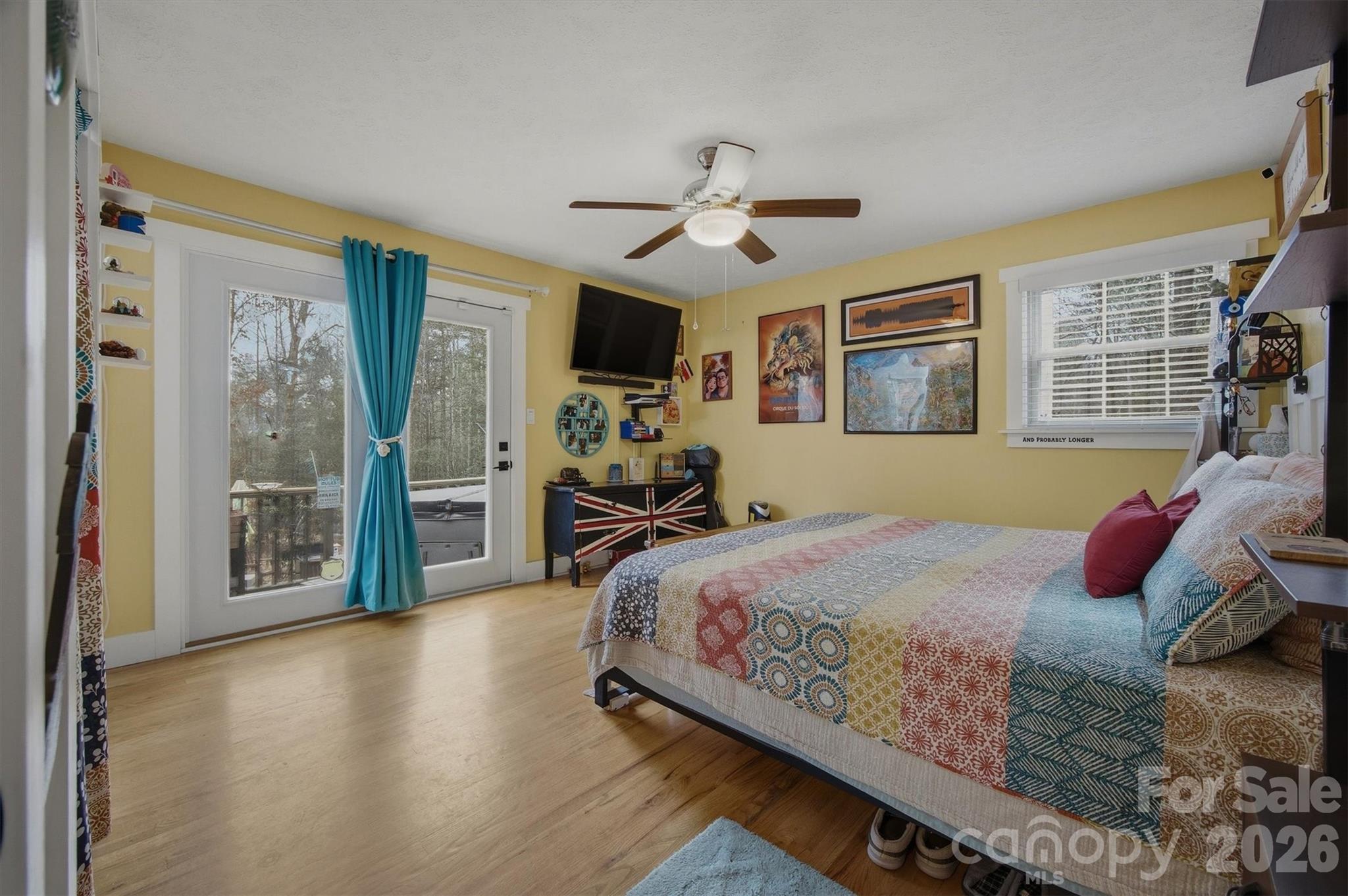 4157 Beck Road Morganton, NC 28655 - Photo 17 of 35 a bedroom with a bed and wooden floor