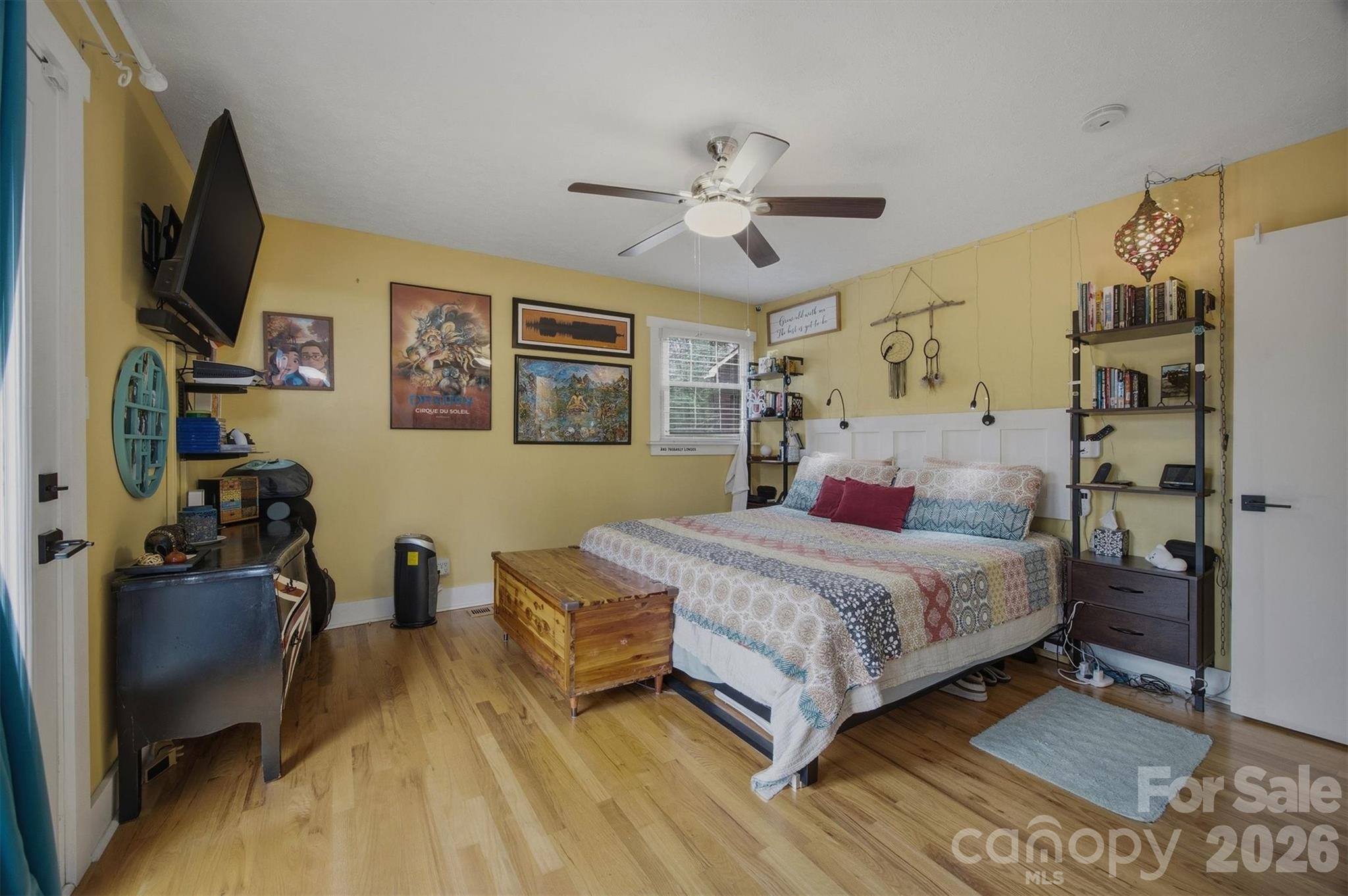 4157 Beck Road Morganton, NC 28655 - Photo 18 of 35 a bedroom with a bed and wooden floor
