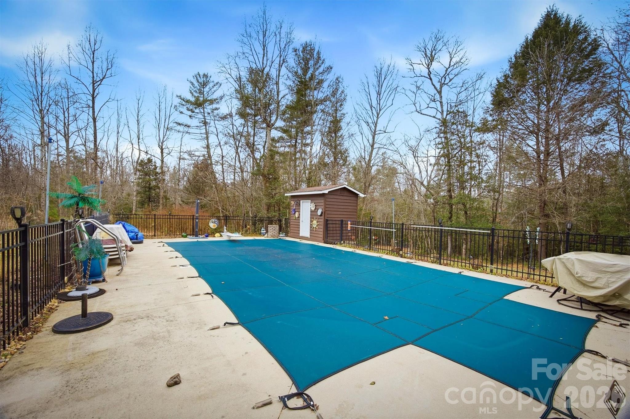 4157 Beck Road Morganton, NC 28655 - Photo 27 of 35 a view of a swimming pool with a patio