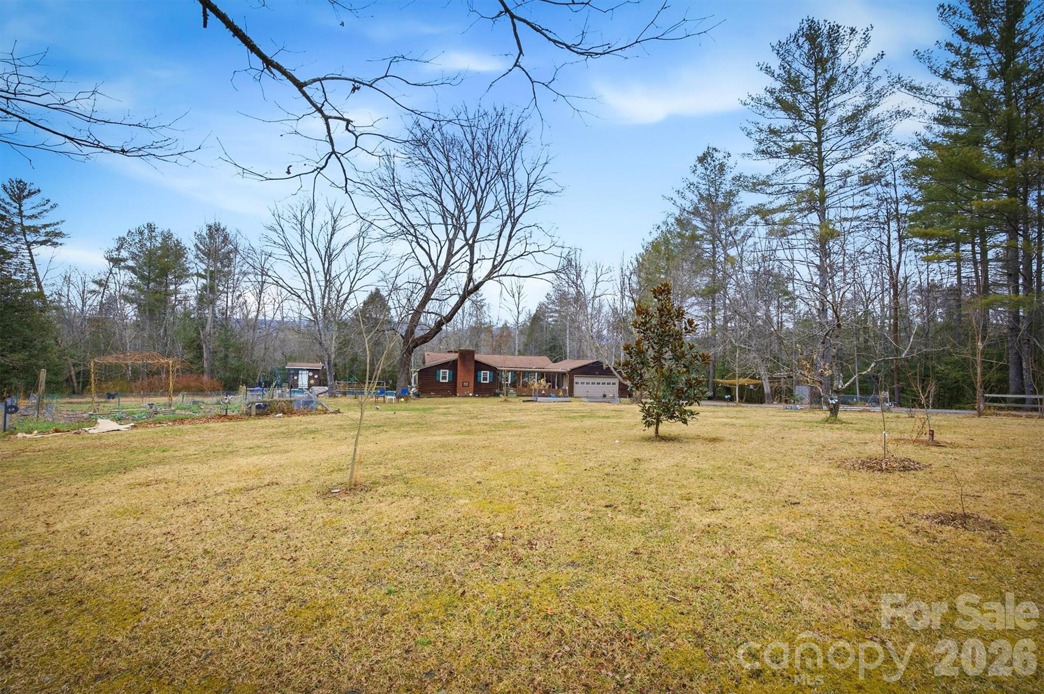 4157 Beck Road Morganton, NC 28655 - Photo 30 of 35 a swimming pool with trees in the background