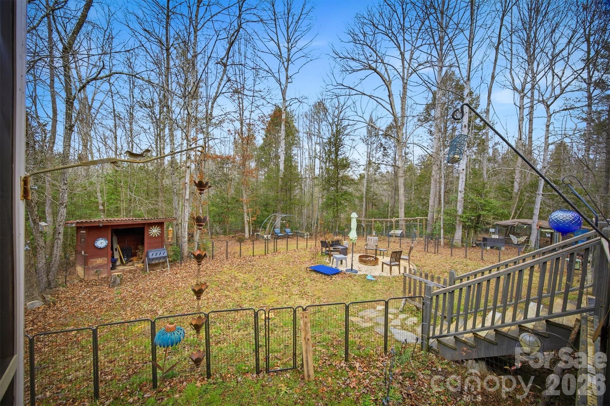 4157 Beck Road Morganton, NC 28655 - Photo 31 of 35 a view of an chairs and tables in the patio