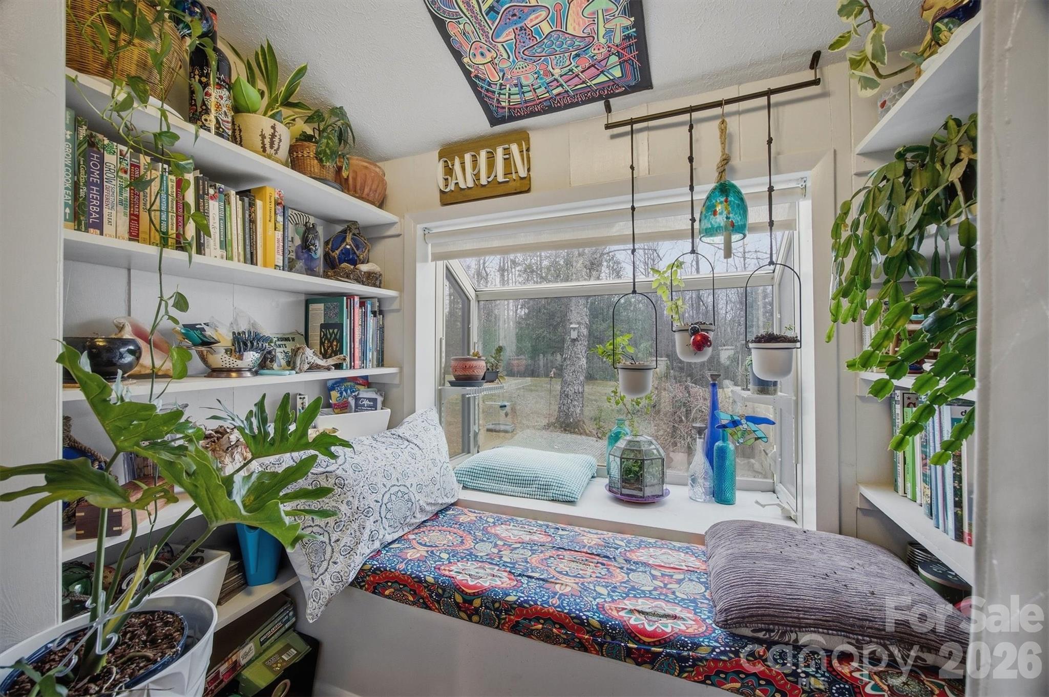 4157 Beck Road Morganton, NC 28655 - Photo 9 of 35 a room with lots of fruit and flowers