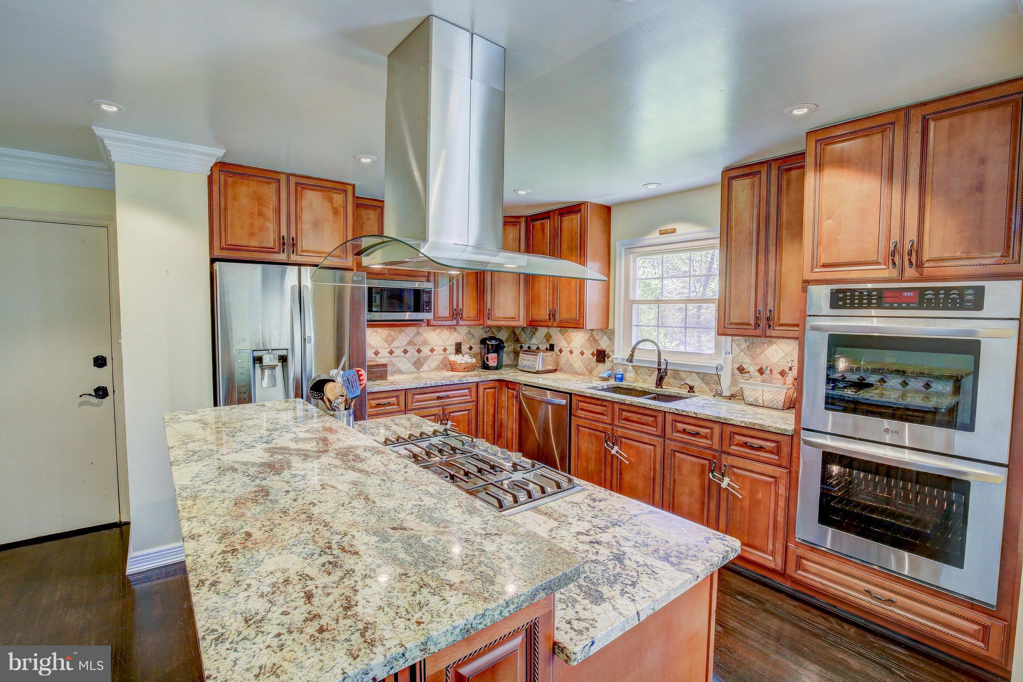 404 Old Stone Road Silver Spring, MD 20904 - Photo 9 of 30 Granite & Stainless Steel Gourmet Kitchen.
