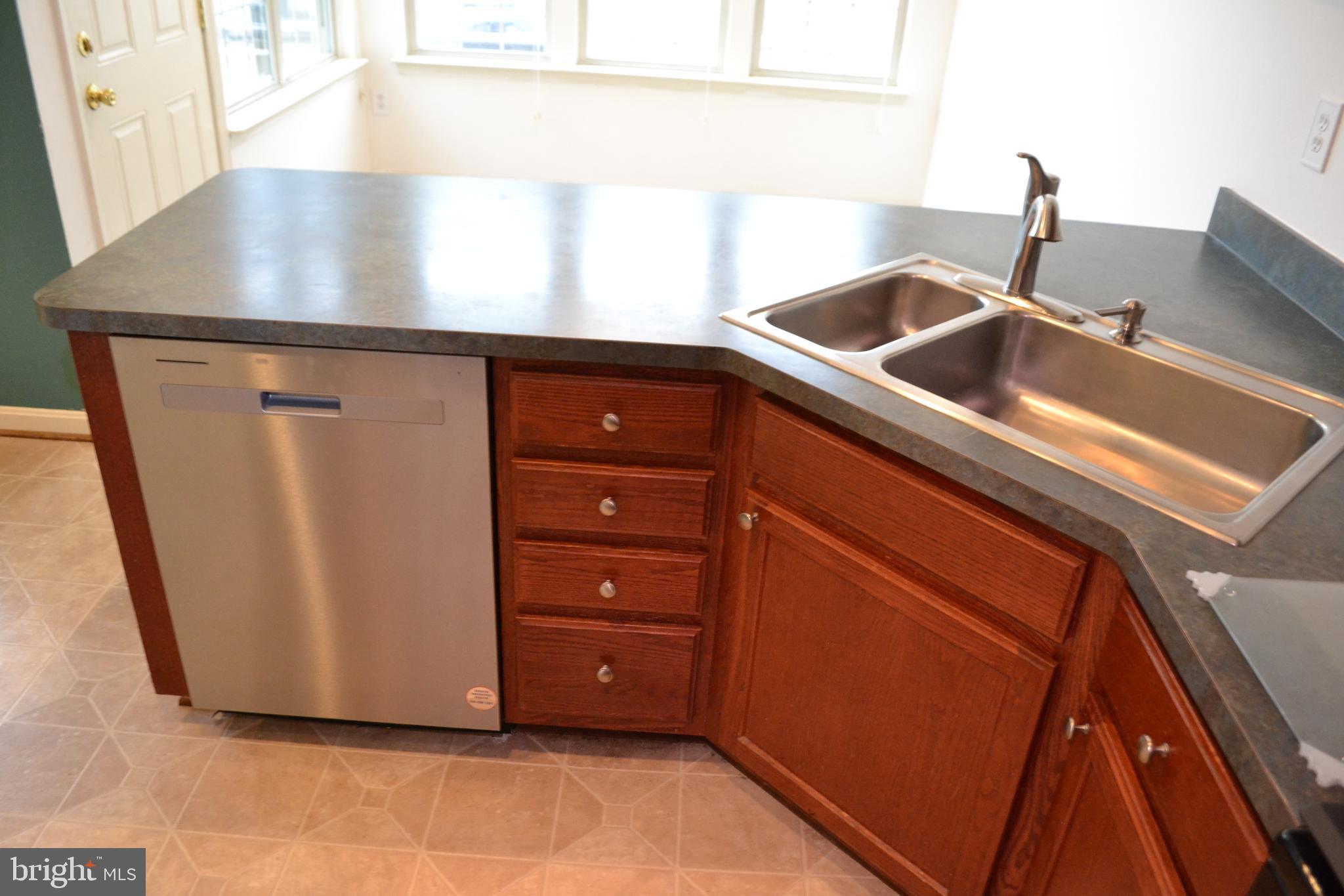 2202 Garden Lane Frederick, MD 21701 - Photo 18 of 50 a kitchen with a sink and a window