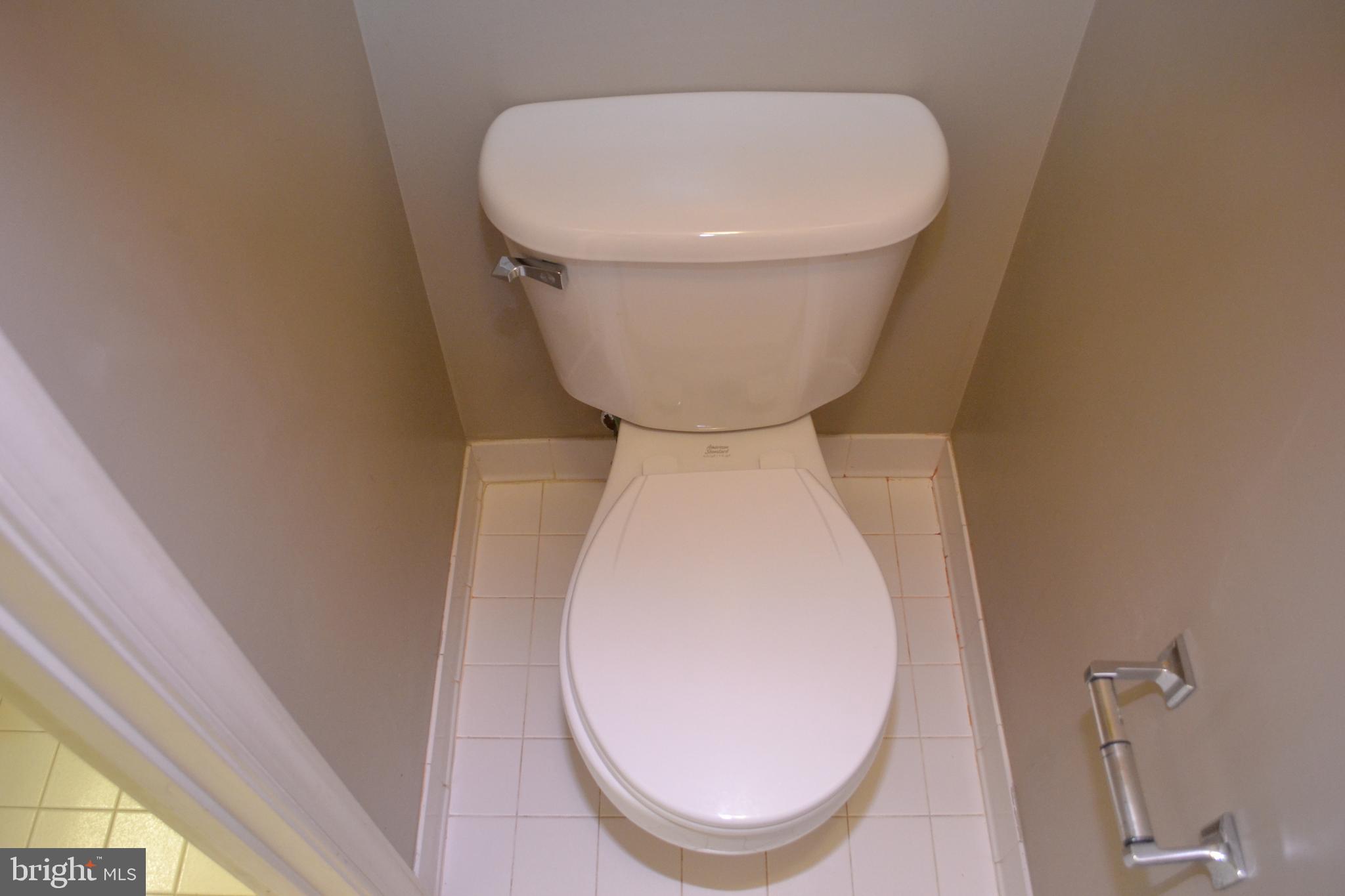 2202 Garden Lane Frederick, MD 21701 - Photo 32 of 50 a close view of a toilet in a bathroom