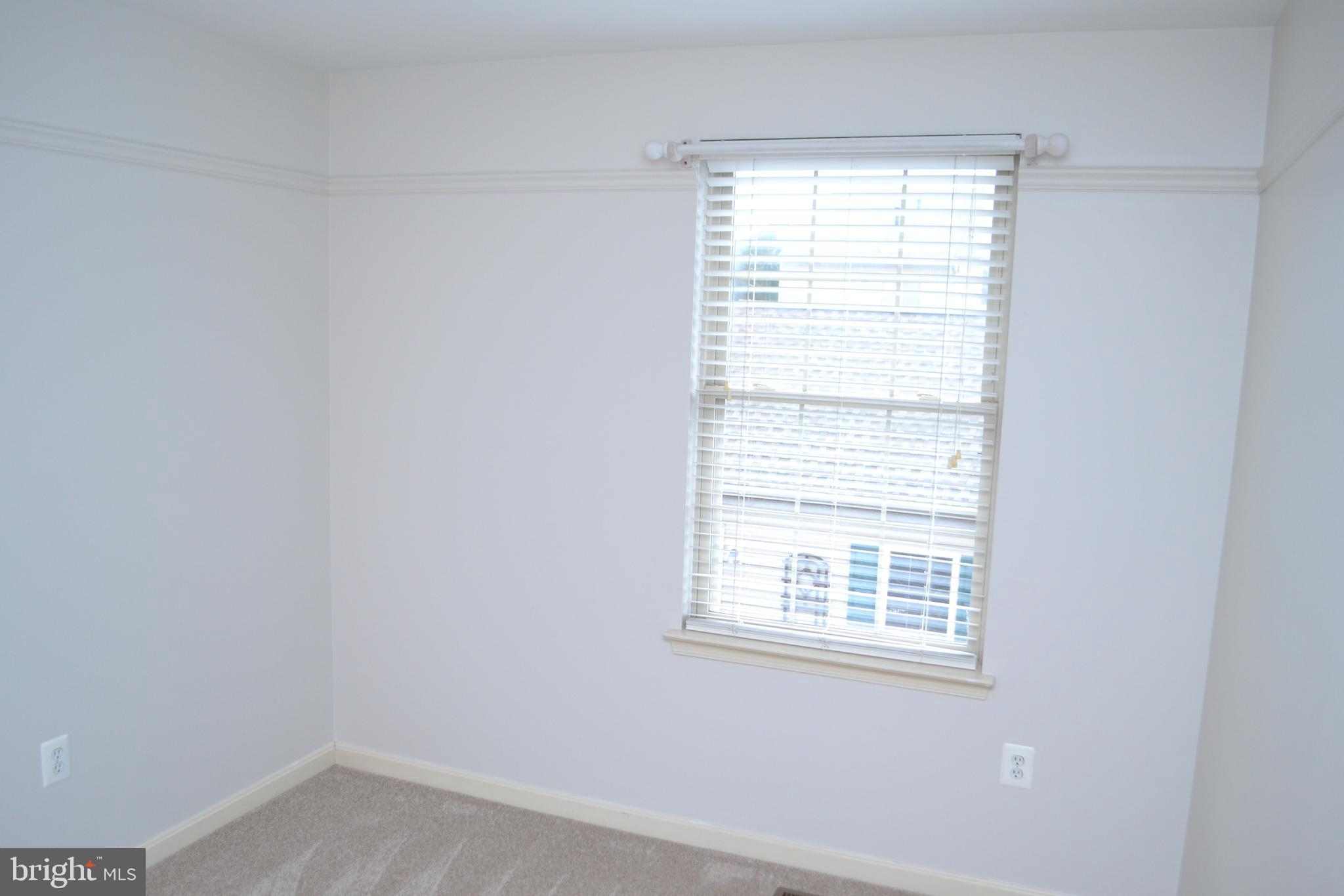 2202 Garden Lane Frederick, MD 21701 - Photo 36 of 50 a view of an empty room with a window