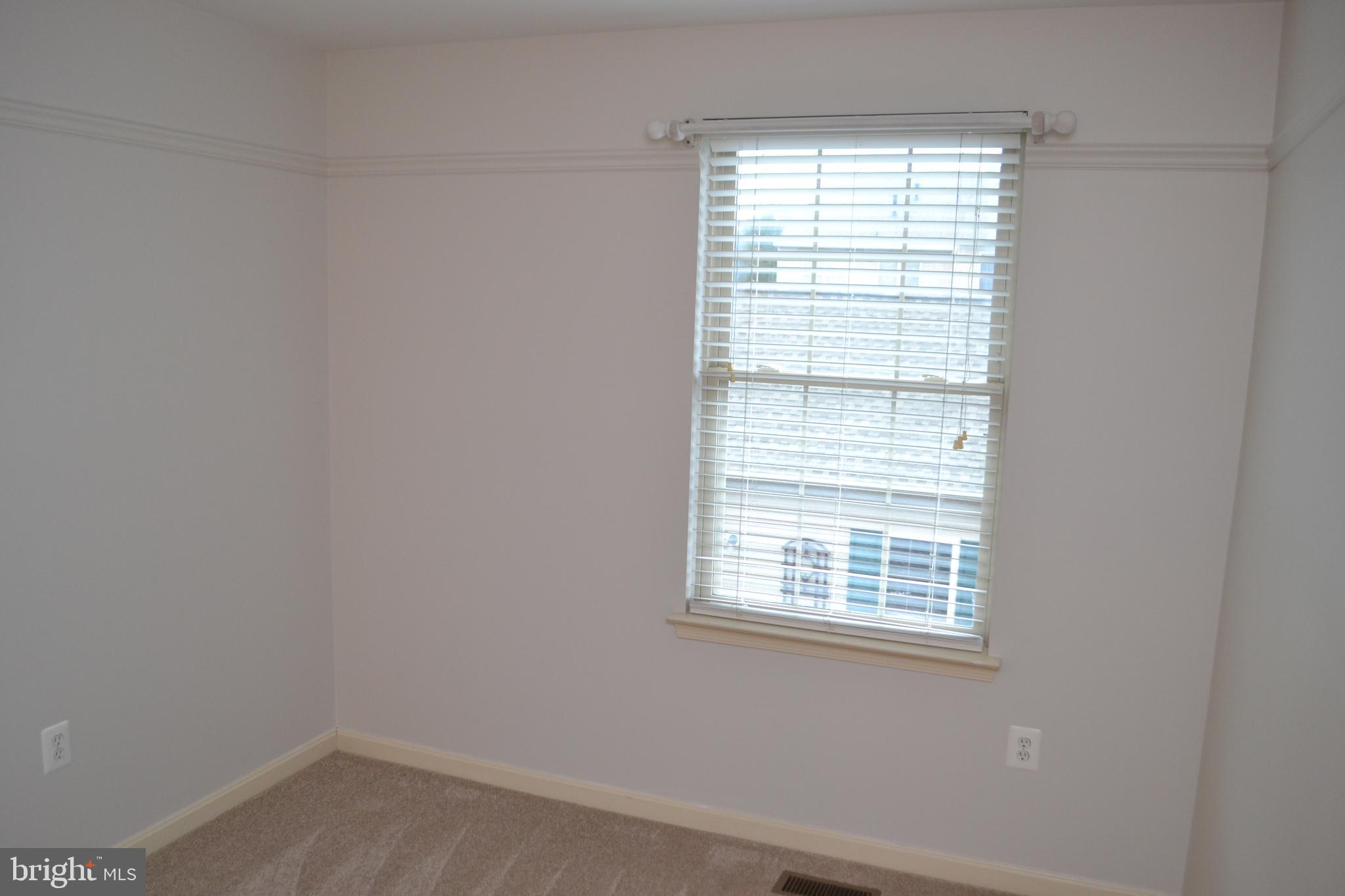 2202 Garden Lane Frederick, MD 21701 - Photo 37 of 50 an empty room with a window
