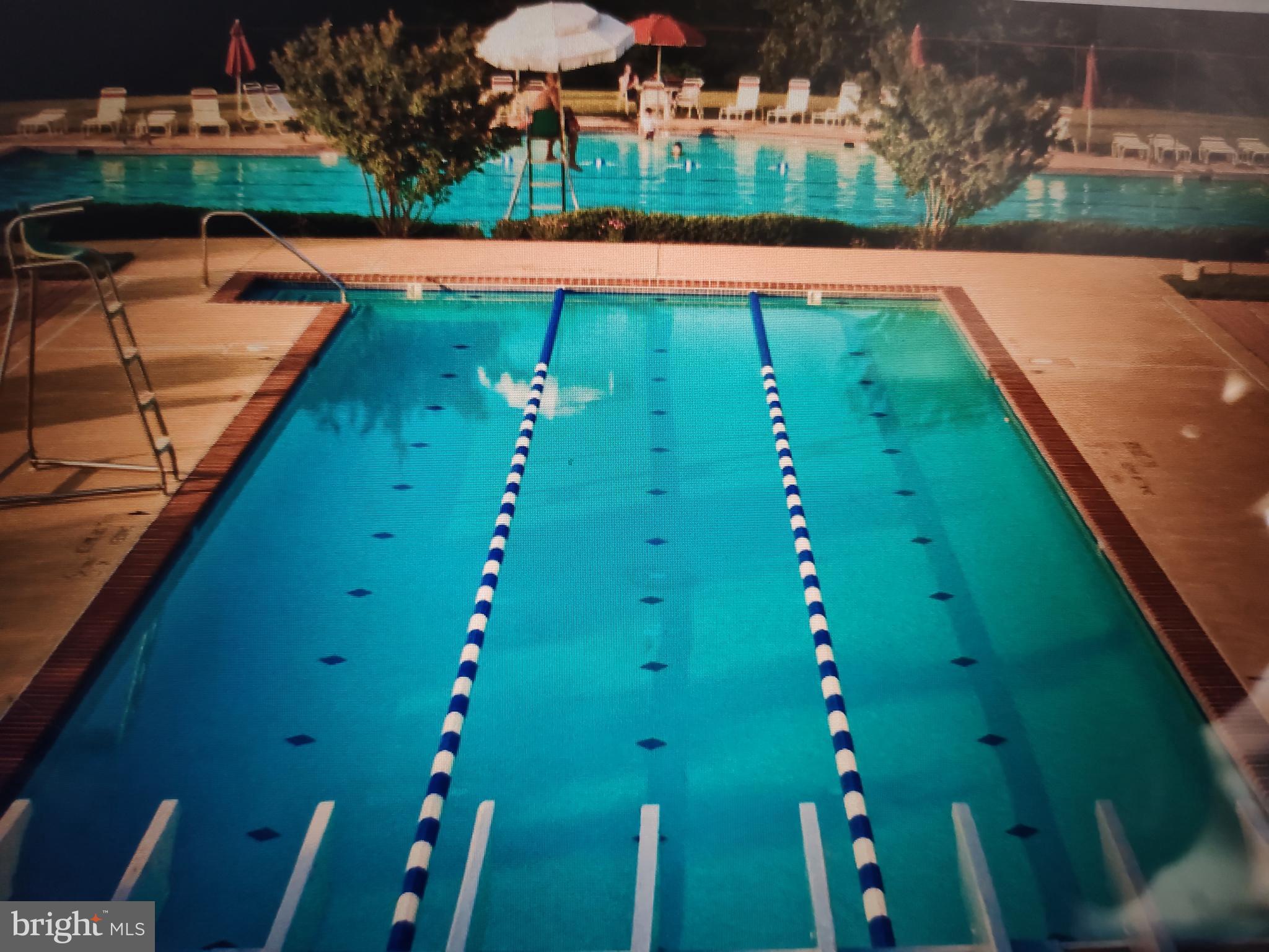 2202 Garden Lane Frederick, MD 21701 - Photo 49 of 50 a view of a swimming pool with a patio