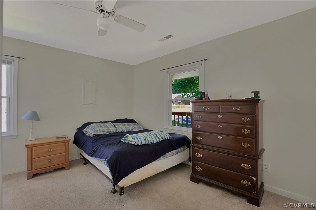 6702 Cherry Road Quinton, VA 23141 - Photo 15 of 20 a bedroom with a bed and a dresser