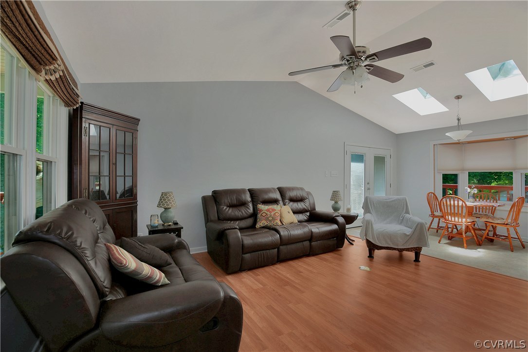 6702 Cherry Road Quinton, VA 23141 - Photo 4 of 20 a living room with furniture and a chandelier