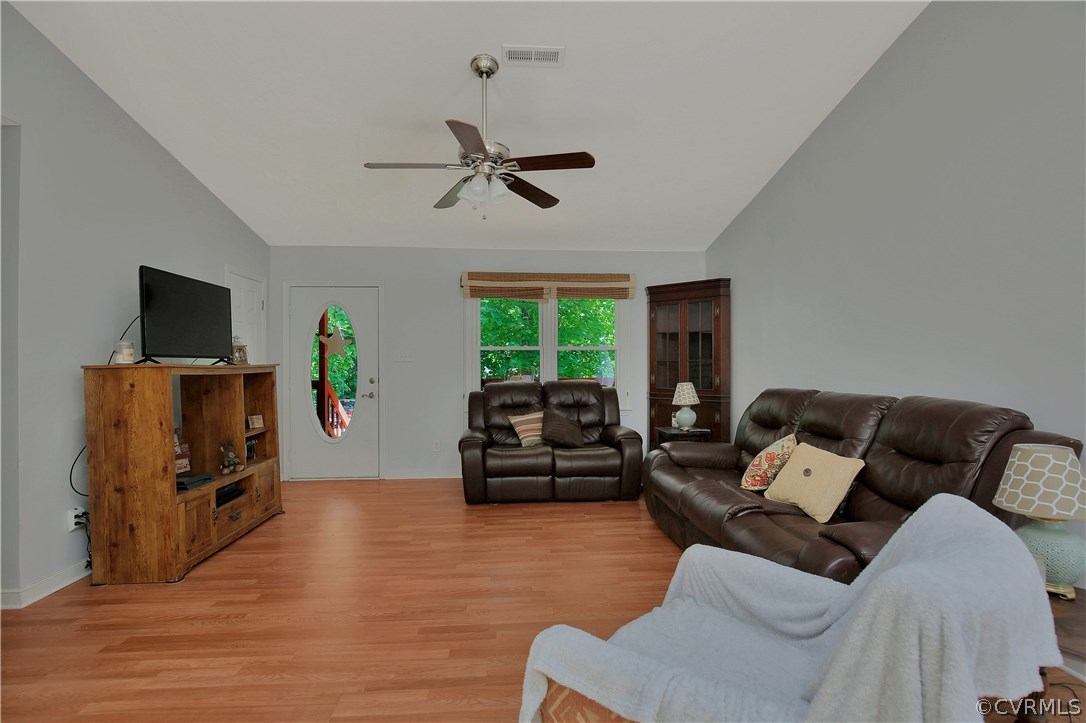 6702 Cherry Road Quinton, VA 23141 - Photo 5 of 20 a living room with furniture window and a flat screen tv