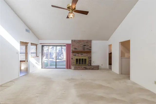a view of a livingroom with a fireplace