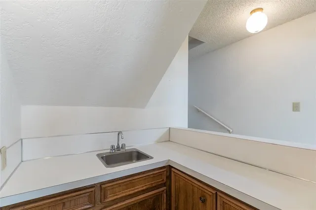 a view of utility room and sink