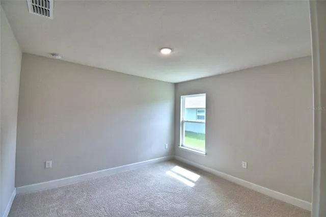 a bathroom with a sink a vanity and a mirror