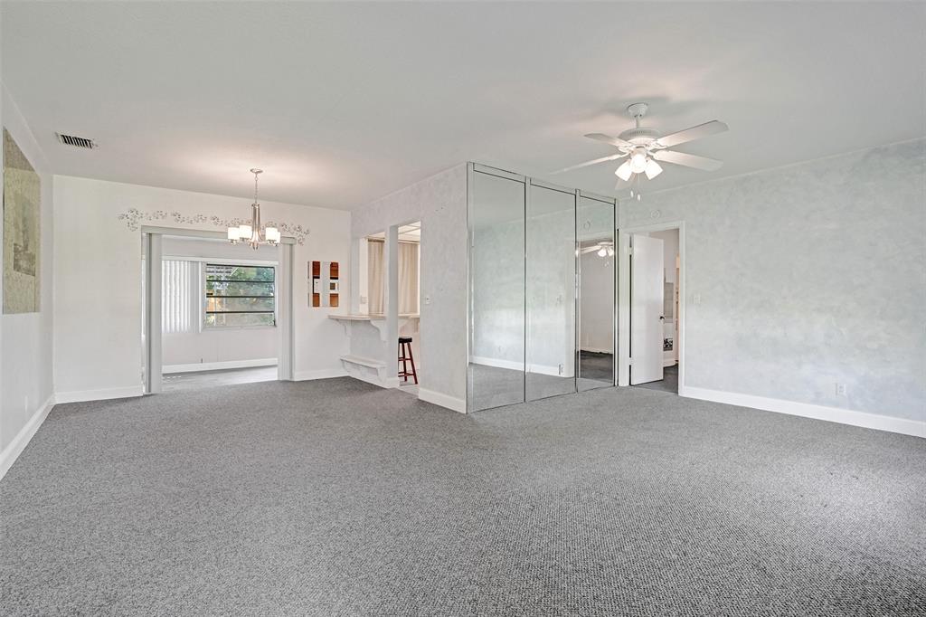 4738 Northwest 5th Street Plantation, FL 33317 - Photo 16 of 68 a view of empty room with a ceiling fan